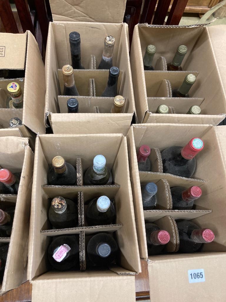 Approximately sixty bottles of assorted wine and liqueurs to include a Chateau Citran Magnum, Australian Semillion, Rouget Pomerol 1967, etc.